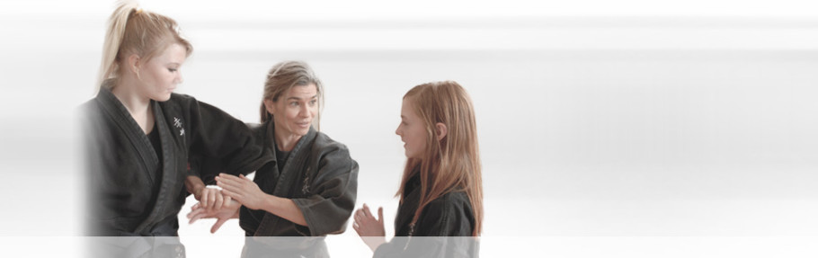 Instructor working with young students at CAMA